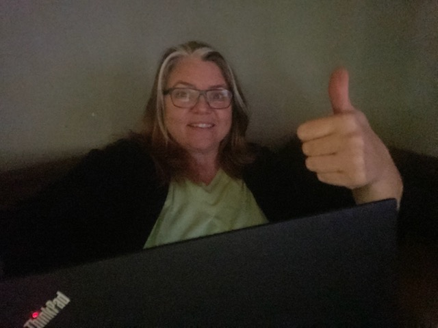 Laurie Ray with a thumbs up